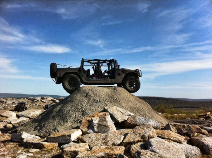Hummer on-top of a hill