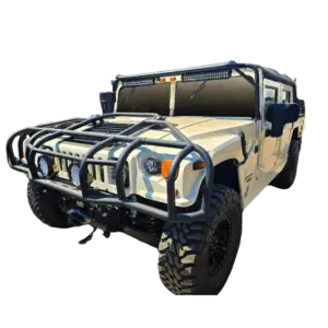 White 1998 Hummer H1 Soft Top with roof rack, brush guard, 12k winch system 6.6 duramax side view