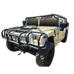 White 1998 Hummer H1 Soft Top with roof rack, brush guard, 12k winch system 6.6 duramax side view