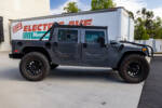 black diamond 2006 hummer h1 alpha open-top with rigid lighting, winch system, brush guard passenger side view