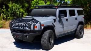 nardo gray 2008 hummer h2 with brush guard, winch system, roof rack with lightbar