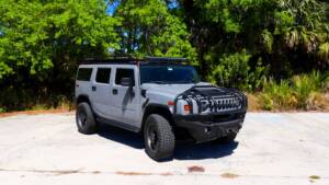 nardo gray 2008 hummer h2 with brush guard, winch system, roof rack with lightbar