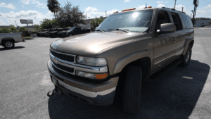 2004 Tan Suburban LT QUADRASTEER 6.6 Duramax with front winch